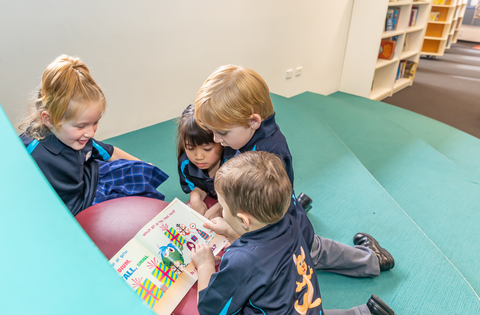 students reading book